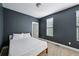 Calm bedroom with neutral carpet, painted walls, and bright, natural light at 743 Taylor Ne Ct, Atlanta, GA 30324