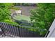 Elevated view of the fenced dog run featuring artificial turf and tasteful landscaping at 743 Taylor Ne Ct, Atlanta, GA 30324