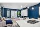 Bright open concept with modern kitchen, island, dining area, and cozy living space at 743 Taylor Ne Ct, Atlanta, GA 30324