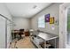 A bright and spacious room features a desk, workstation, and large work table at 743 Taylor Ne Ct, Atlanta, GA 30324
