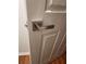Contemporary white door with sleek silver handle, enhancing the home's modern aesthetic at 1502 Countryside Se Pl # 1502, Smyrna, GA 30080