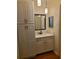 Updated bathroom featuring new cabinets, modern fixtures, and stylish lighting at 3301 Henderson Mill Rd # J1, Atlanta, GA 30341