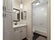 Bathroom featuring a shower-tub combo and granite counter at 3301 Henderson Mill Rd # J1, Atlanta, GA 30341
