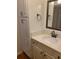 Bright bathroom with white vanity and a framed mirror at 3301 Henderson Mill Rd # J1, Atlanta, GA 30341