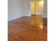 Spacious living room featuring hardwood floors at 3301 Henderson Mill Rd # J1, Atlanta, GA 30341