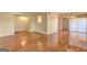Spacious living room featuring hardwood floors, natural light, and an open floor plan at 3301 Henderson Mill Rd # J1, Atlanta, GA 30341