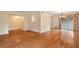 Expansive living area with hardwood floors and access to an enclosed patio at 3301 Henderson Mill Rd # J1, Atlanta, GA 30341