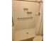 Accessible shower with grab bar and tiled walls at 3301 Henderson Mill Rd # J1, Atlanta, GA 30341