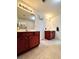 Spacious bathroom with double sinks, two vanities and tile floors at 3981 Isaac Ct, Lilburn, GA 30047