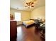 Cozy bedroom features a window, bed, and desk area, perfect for work or relaxation at 3981 Isaac Ct, Lilburn, GA 30047