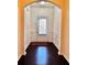 View of the entryway with hardwood floors and white wainscoting and neutral walls at 3981 Isaac Ct, Lilburn, GA 30047