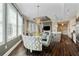 Open-concept dining area with views of the living room and modern kitchen at 58 Canton St # 404, Alpharetta, GA 30009