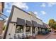 A charming restaurant exterior with outdoor seating, perfect for dining under the sky at 58 Canton St # 404, Alpharetta, GA 30009
