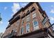 Stunning brick building with wrought iron balconies offering gorgeous views and historic charm at 58 Canton St # 404, Alpharetta, GA 30009
