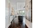 Hallway leading into kitchen and living spaces at 58 Canton St # 404, Alpharetta, GA 30009