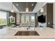 Open floor plan showcases a modern kitchen flowing into a comfortable living area at 58 Canton St # 404, Alpharetta, GA 30009