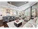 Elegant living room showcasing an open layout, modern kitchen, and stylish decor at 58 Canton St # 404, Alpharetta, GA 30009