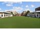 A vibrant outdoor space with restaurants and open lawn, perfect for community events and relaxation at 58 Canton St # 404, Alpharetta, GA 30009