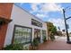 Comeback Vinyl's inviting storefront with bright windows and sidewalk planters at 58 Canton St # 404, Alpharetta, GA 30009