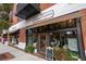 Charming storefront of The Red Hound, featuring large display windows and a welcoming entrance at 58 Canton St # 404, Alpharetta, GA 30009