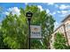 Taste of Alpharetta banner hanging from light pole, lush greenery, and building facade at 58 Canton St # 404, Alpharetta, GA 30009