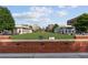 View of Alphaeatta's beautiful central green surrounded by shops and restaurants at 58 Canton St # 404, Alpharetta, GA 30009