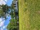 Modest one-story home featuring a grassy yard, offering a peaceful, suburban living experience at 6136 Holiday Blvd, Forest Park, GA 30297