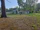 View of the home across the front yard at 6136 Holiday Blvd, Forest Park, GA 30297
