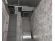 Updated kitchen with stainless steel appliances and modern gray cabinets at 6136 Holiday Blvd, Forest Park, GA 30297