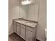 Bright bathroom vanity with granite countertop, undermount sink, and modern lighting at 115 Deer Xing, Temple, GA 30179