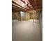 Spacious unfinished basement featuring exposed ceiling and framing at 528 Earnest Ln, Temple, GA 30179