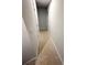 Hallway with carpeting and a white door at 528 Earnest Ln, Temple, GA 30179