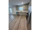 Modern kitchen featuring stainless steel appliances, sleek countertops, and stylish cabinetry at 528 Earnest Ln, Temple, GA 30179