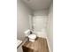 Bathroom featuring tub-shower combination and standard toilet at 127 Deer Xing, Temple, GA 30179
