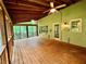 Relaxing patio with ceiling fans, overlooking the beautiful wooded backyard at 1461 Fox Forest Sw Ter, Lilburn, GA 30047