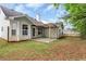 Expansive backyard with a covered patio is perfect for outdoor entertaining at 285 Kentshire Pl, Lawrenceville, GA 30044