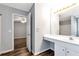 Bathroom featuring a vanity, mirror, and walk-in closet at 285 Kentshire Pl, Lawrenceville, GA 30044