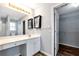 Bright bathroom with a vanity, walk-in closet, and modern finishes at 285 Kentshire Pl, Lawrenceville, GA 30044