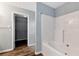 Bright bathroom with a bathtub, walk-in closet, and modern finishes at 285 Kentshire Pl, Lawrenceville, GA 30044