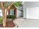View of the house featuring a well-manicured lawn and mature landscaping at 285 Kentshire Pl, Lawrenceville, GA 30044