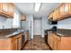 Open-concept kitchen with stainless steel appliances and granite countertops at 285 Kentshire Pl, Lawrenceville, GA 30044
