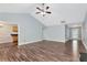Large living room leading to the kitchen area with vaulted ceiling at 285 Kentshire Pl, Lawrenceville, GA 30044