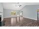 Spacious living room featuring a vaulted ceiling and an entry to the kitchen at 285 Kentshire Pl, Lawrenceville, GA 30044