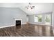 Spacious living room with high ceilings, a fireplace, and access to the backyard at 285 Kentshire Pl, Lawrenceville, GA 30044