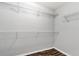 Empty walk-in closet featuring wire shelving at 285 Kentshire Pl, Lawrenceville, GA 30044