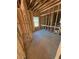Bedroom in mid-construction features stud framing and window, awaiting personalized finishes and design details at 451 Courthouse Park Dr, Temple, GA 30179