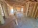 Hallway under construction displaying wood frame and view to rooms ready to be customized and personalized at 451 Courthouse Park Dr, Temple, GA 30179