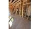 Open-concept design with wood frame construction and views of adjacent rooms at 451 Courthouse Park Dr, Temple, GA 30179