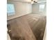 Spacious bedroom with neutral carpet, a ceiling fan, and natural light at 836 Courthouse Park Dr, Temple, GA 30179