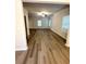 Bright living room featuring modern flooring and an open concept design at 836 Courthouse Park Dr, Temple, GA 30179
